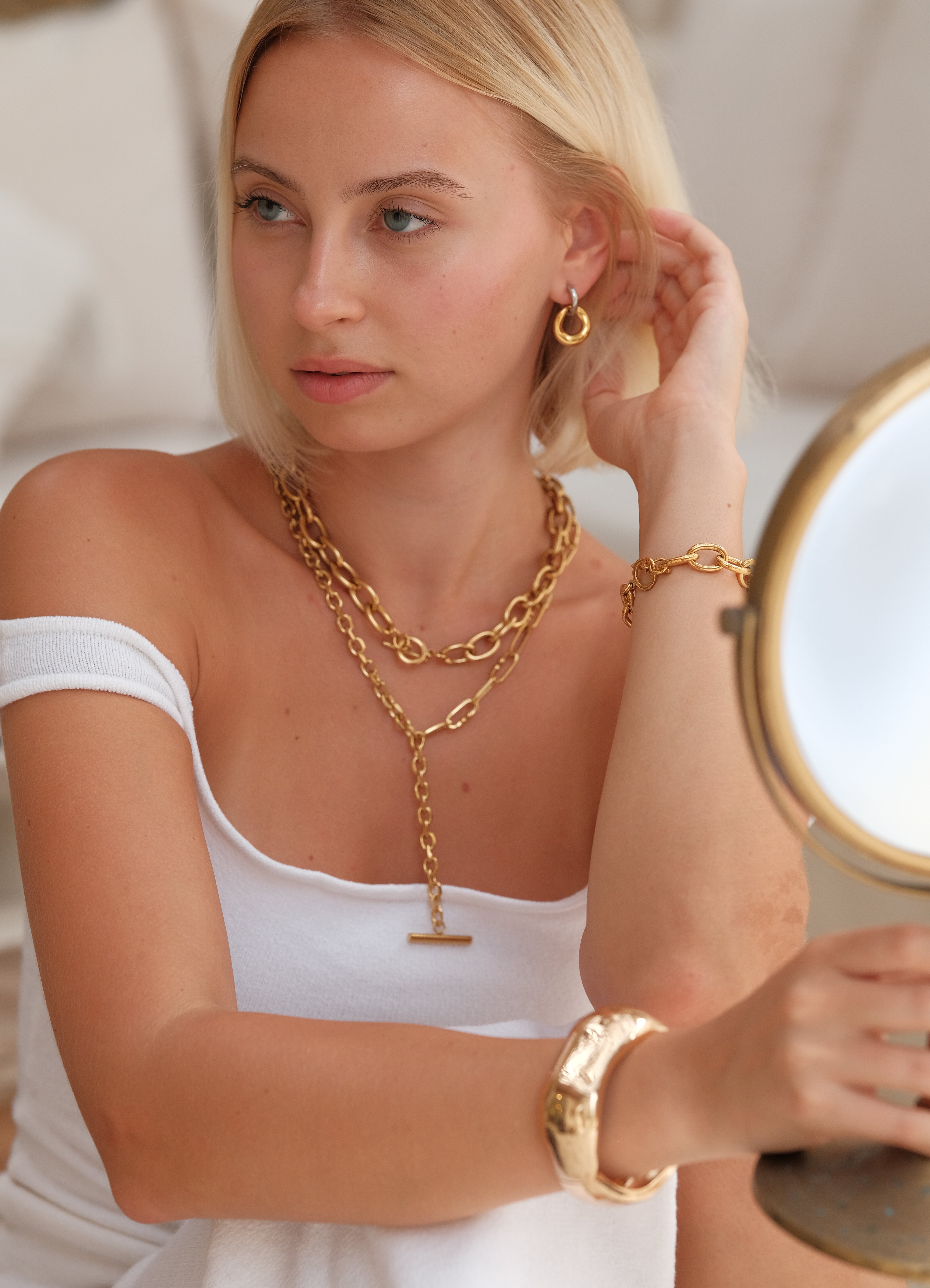 Emery Two-Tone Interlock Huggies by Lucy Luna Jewellery, alternate view 5